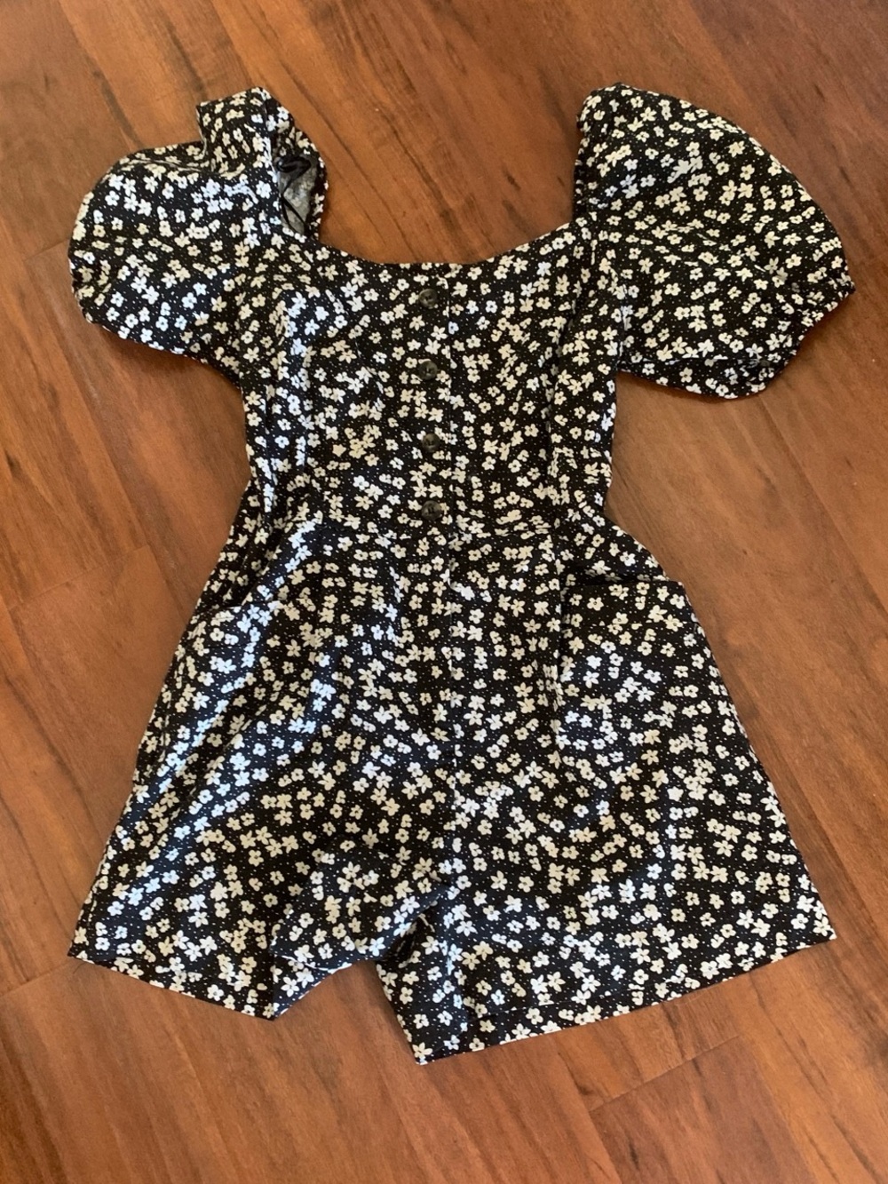 Black Daisy Puff Sleeve Romper, can be worn on or off the shoulders